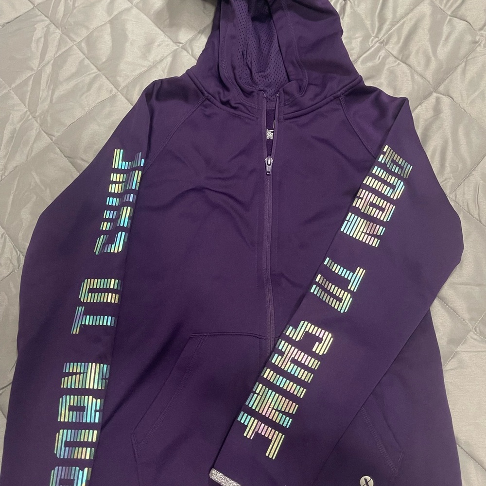 Girls xersion purple hoodie. New without tags. Excellent condition.